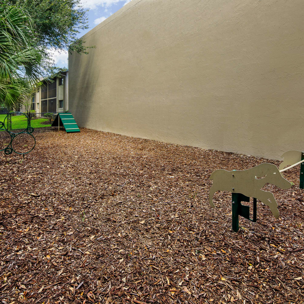 Pet park with bark and grass at WestEnd Apartments in Tampa, Florida