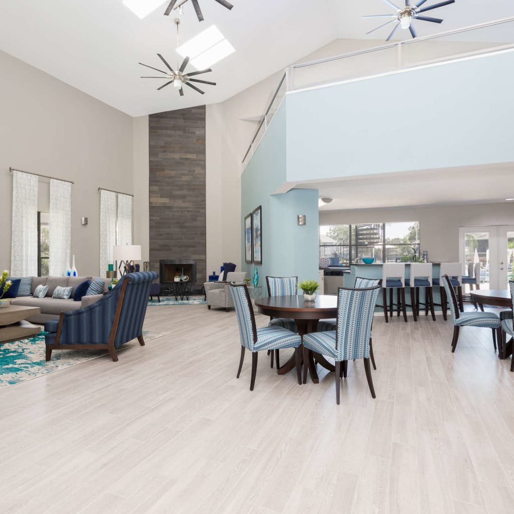 Clubhouse with wood-style flooring at WestEnd Apartments in Tampa, Florida