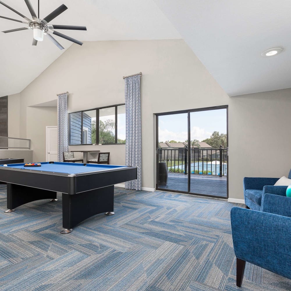 Game room with a billiards table at WestEnd Apartments in Tampa, Florida