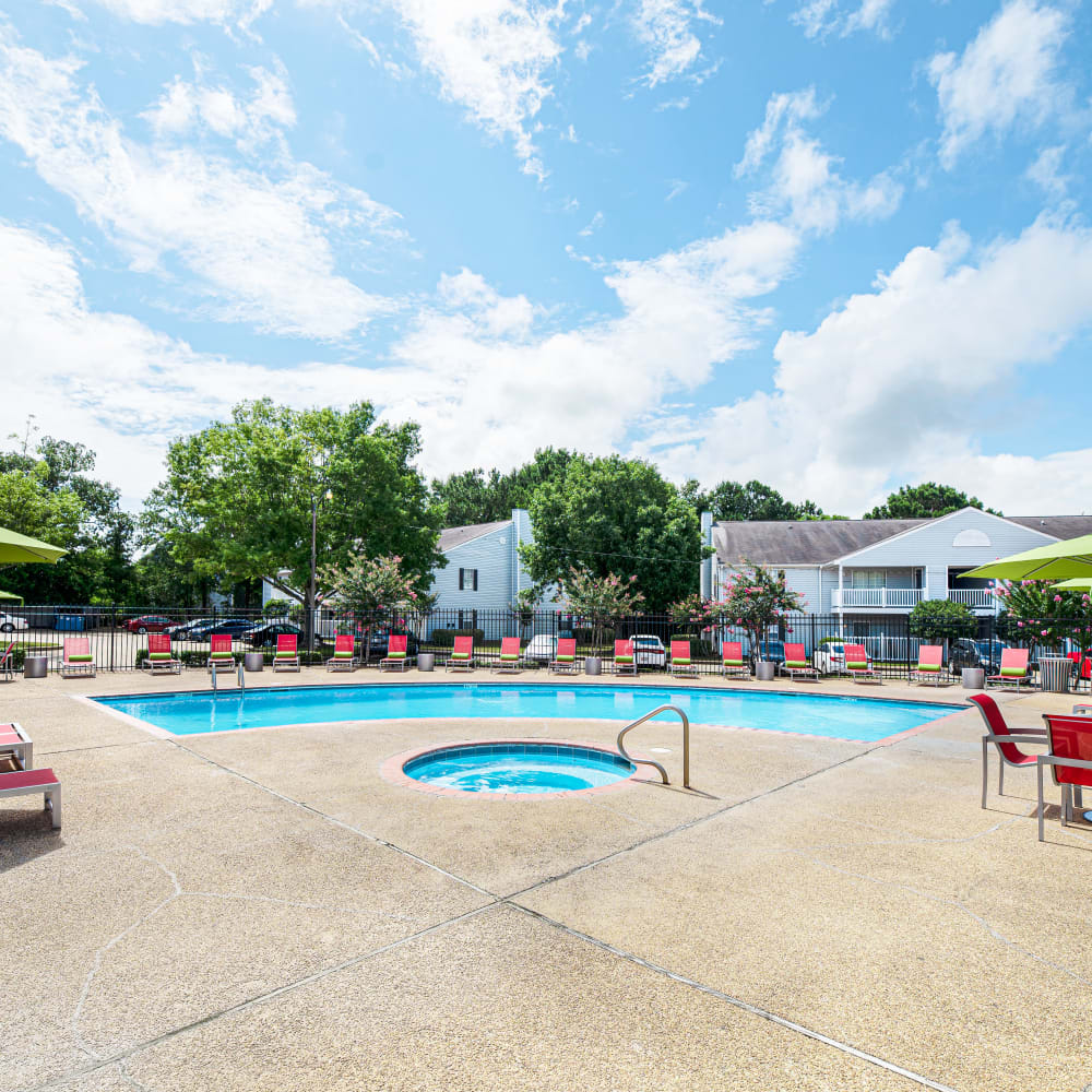 Our luxurious pool area at Bradford Place Apartments in Byram, Mississippi