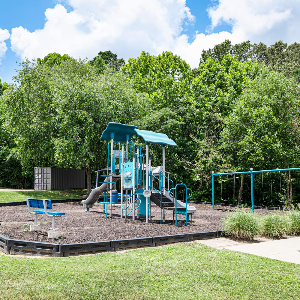 A playground and manicured lawn at Midsouth 301 in Jackson, Mississippi