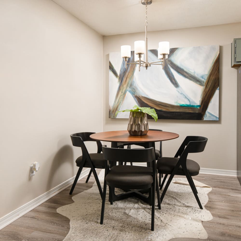 A dining table and chairs in a model apartment at Midsouth 301 in Jackson, Mississippi