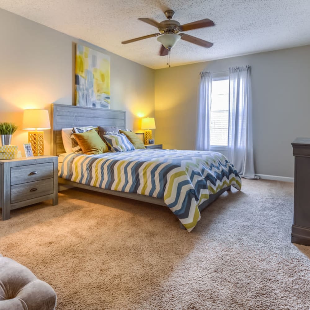Plush carpeting in a furnished apartment bedroom at Northbrook & Pinebrook in Ridgeland, Mississippi