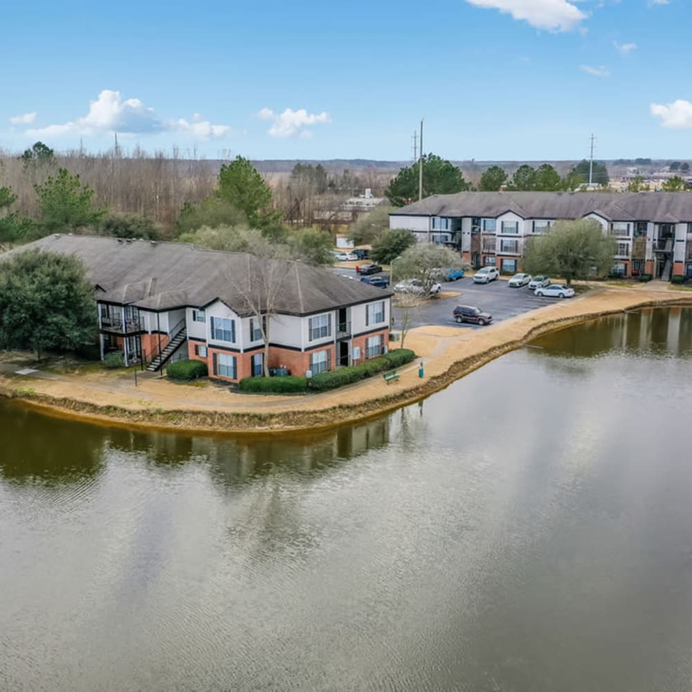 An aerial view of the pond and surrounding apartment buildings at Windsor Lake in Brandon, Mississippi