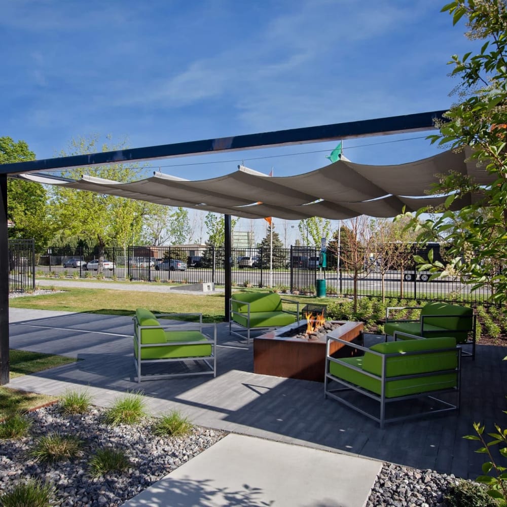 Outdoor community gathering areas at Enclave at Redwood in West Valley City, Utah