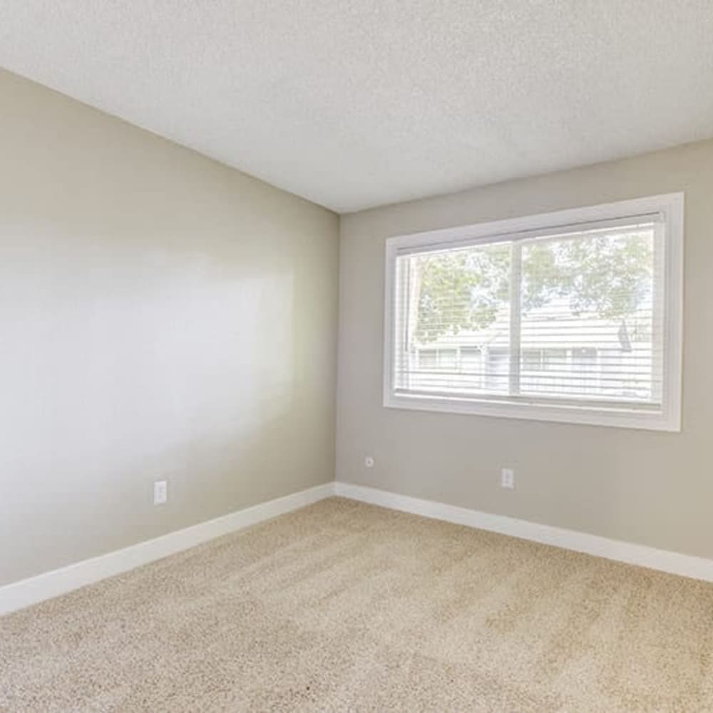 Master bedroom with plush carpeting at Sixty58 Townhomes in Sacramento, California