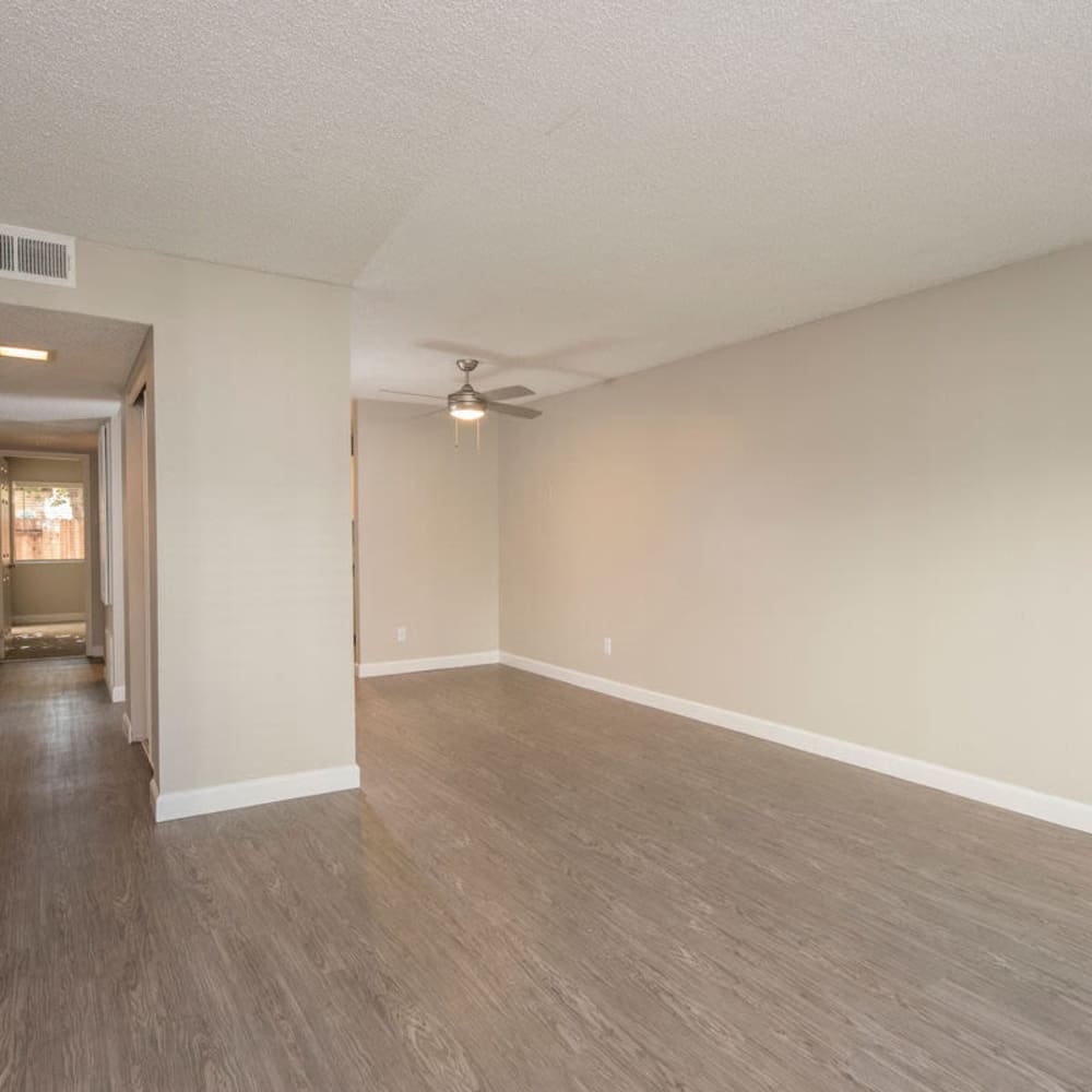 Living space with a ceiling fan at Waverly Flats in Sacramento, California