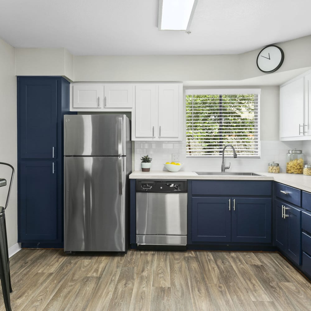 Kitchen with stainless-steel appliances at Mission Springs in Tempe, Arizona