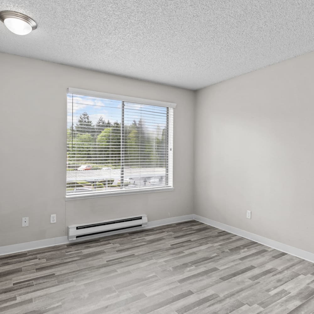 Bedroom with wood-style flooring at Constellation in Renton, Washington