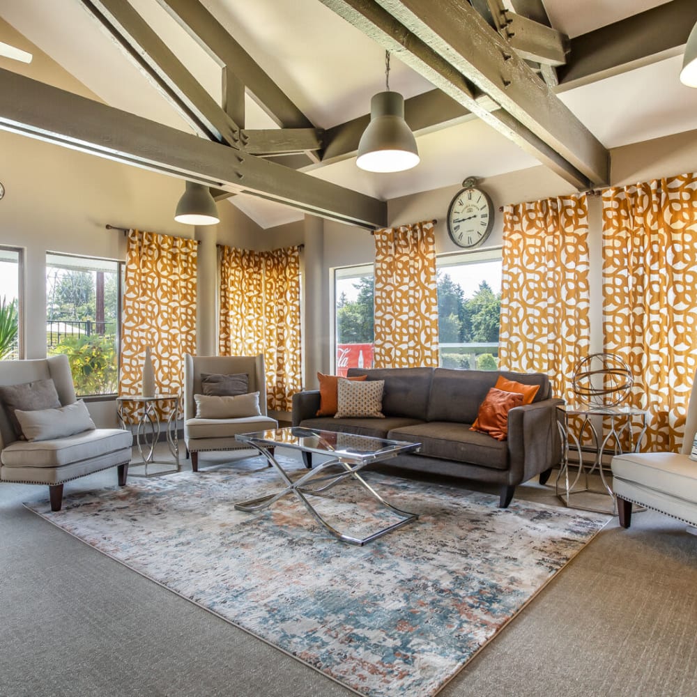 Clubhouse semi private spaces with couches and chairs at Constellation in Renton, Washington