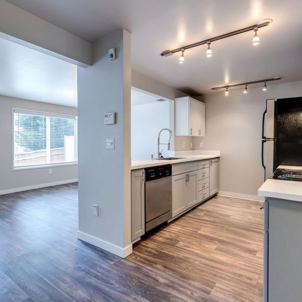Kitchen with appliances at Townhomes at Mountain View in Puyallup, Washington