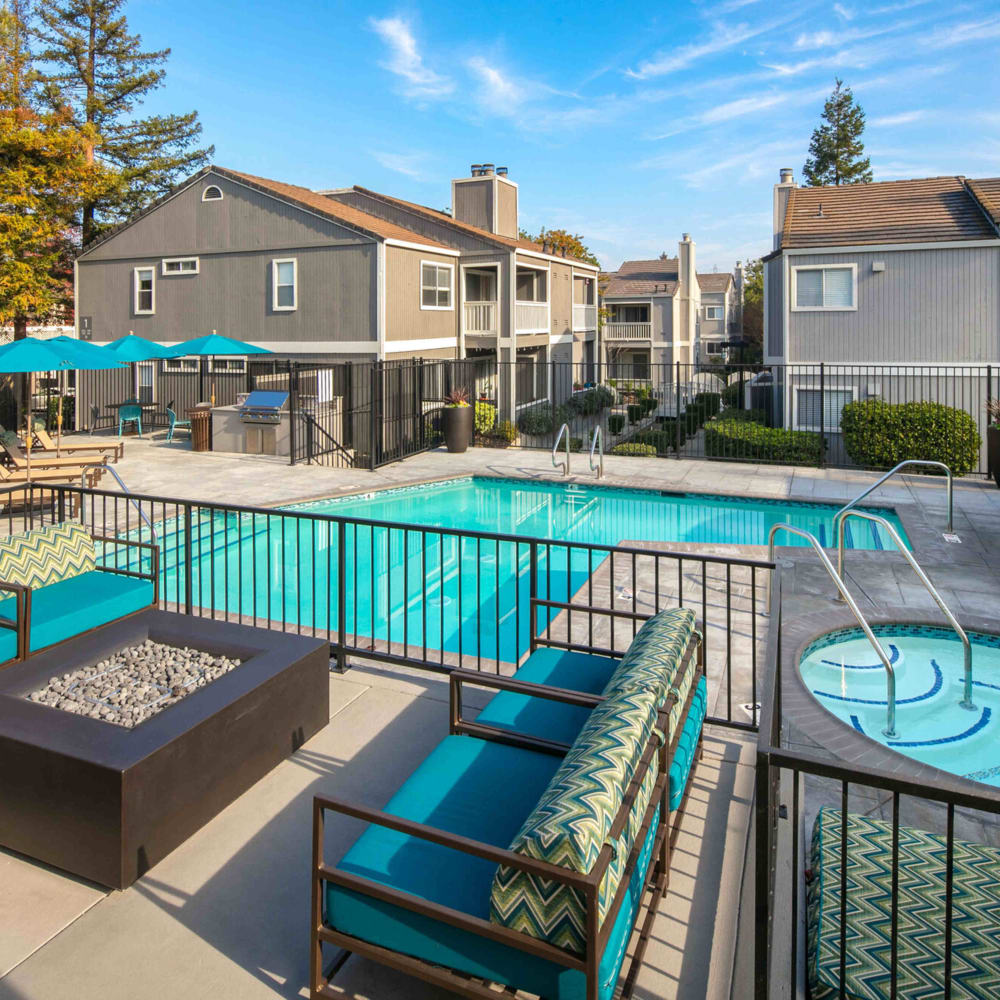 Swimming pool with spa and firepit at The Hayden in Martinez, California