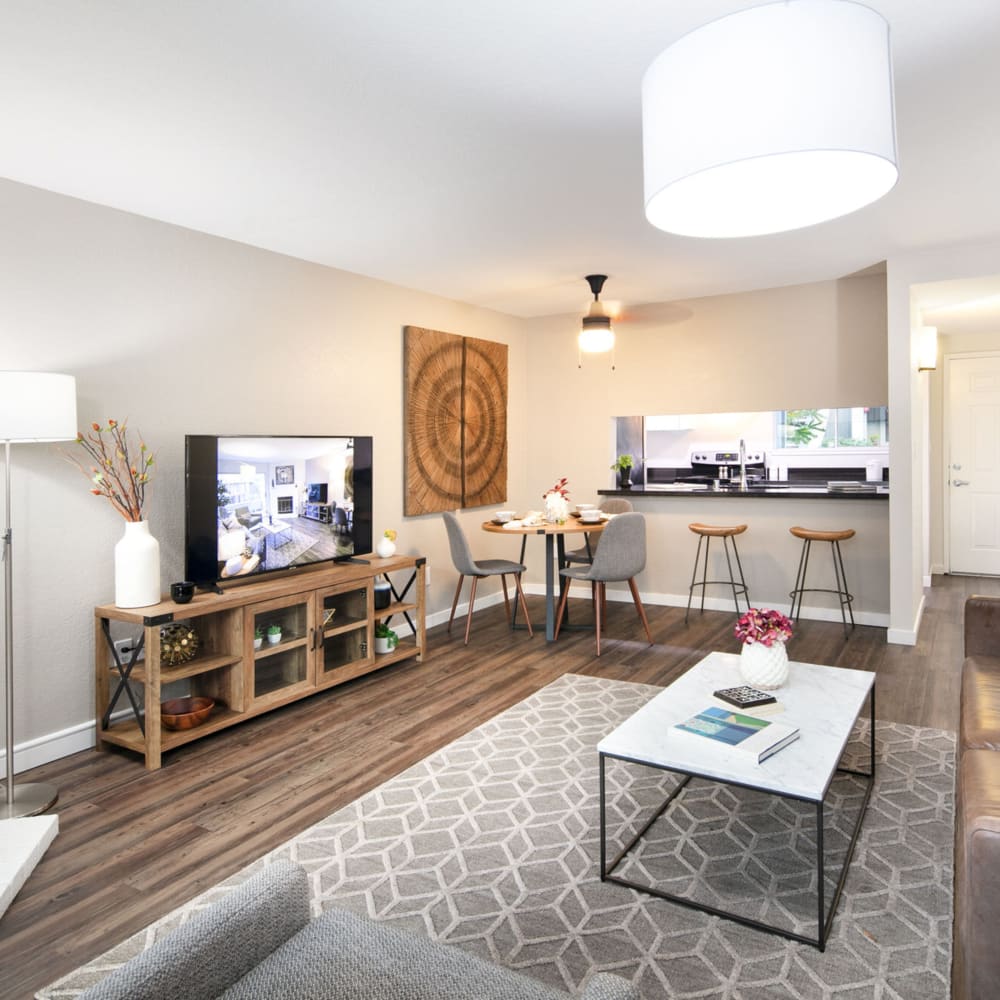 Model living space with wall-art at The Hayden in Martinez, California