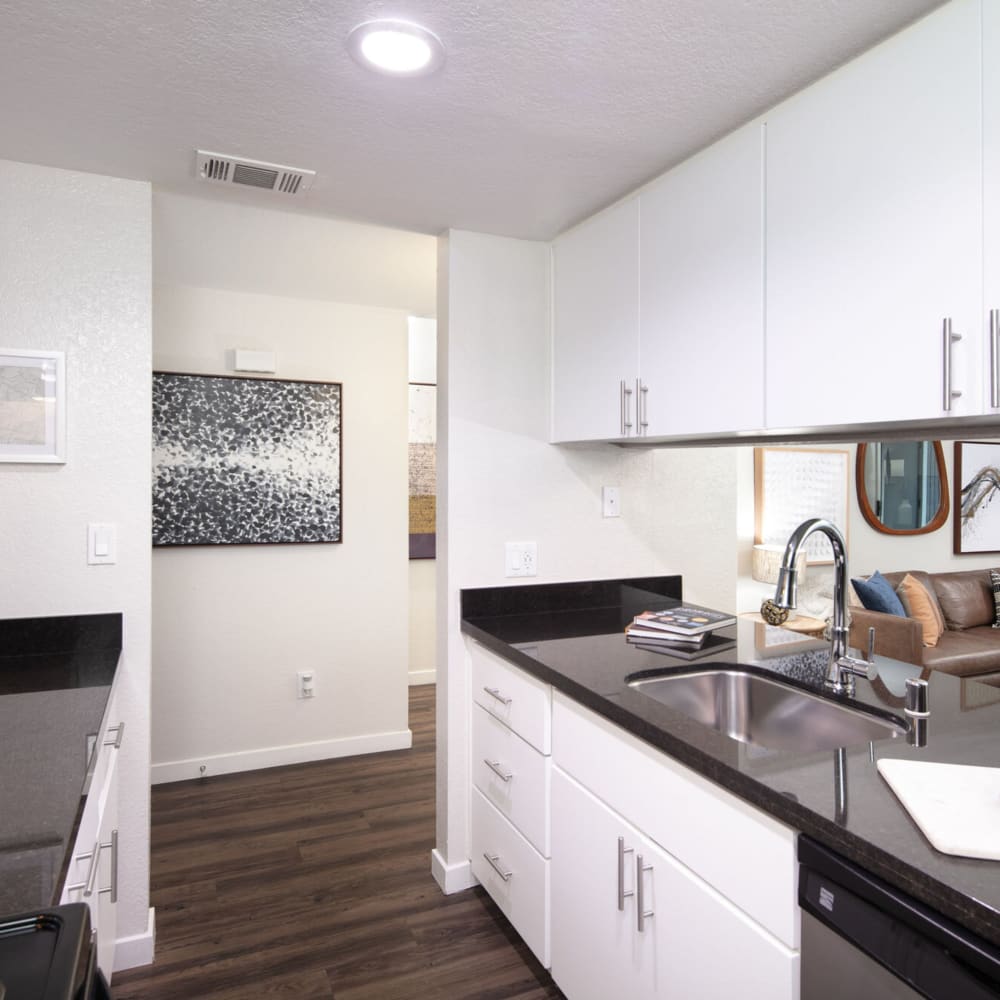 Model kitchen with black accents at The Hayden in Martinez, California