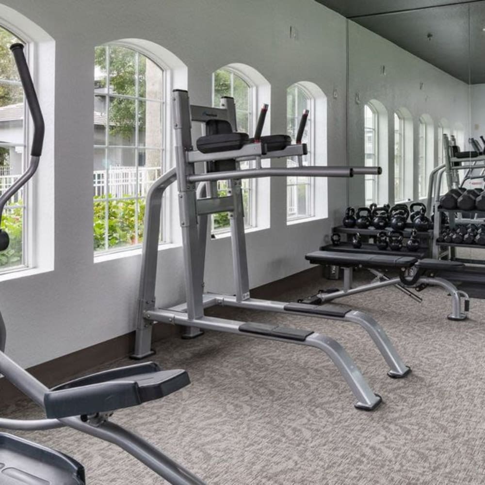 Fitness center with free weights at The Fairways at Lake Mary in Lake Mary, Florida