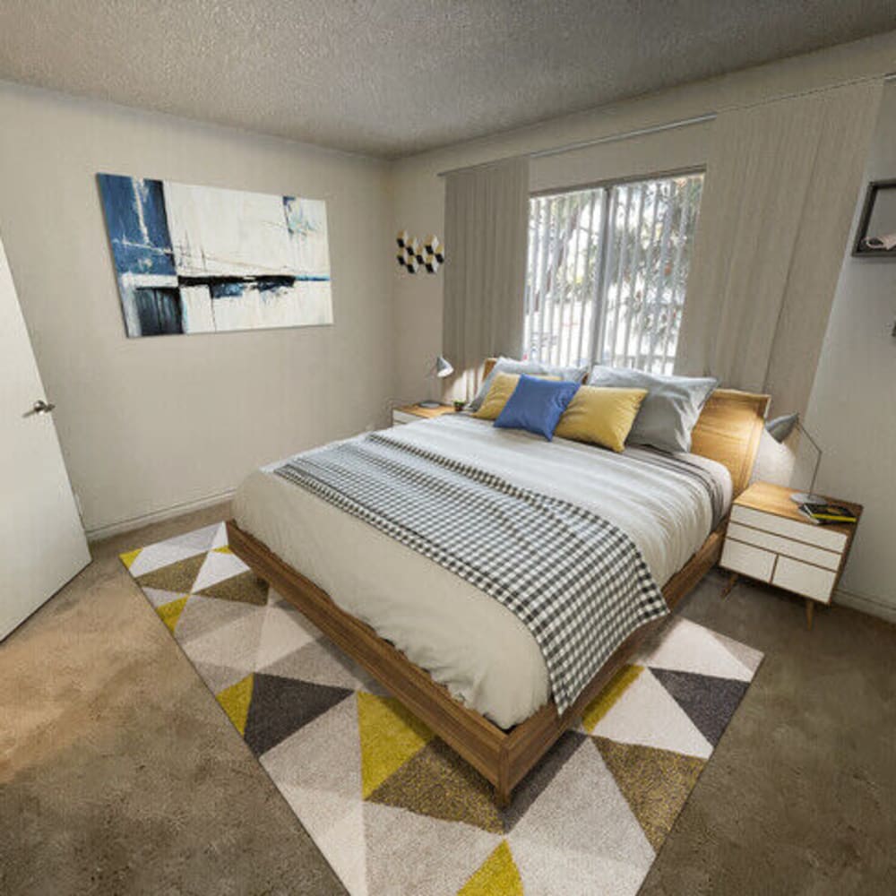 Bedroom with plush carpeting at Bloom Beverly Hills in Los Angeles, California