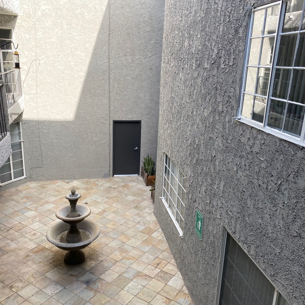 Courtyard with a water fountain at Bloom Beverly Hills in Los Angeles, California
