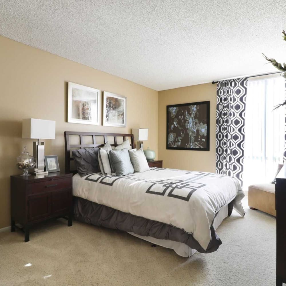 Master bedroom featuring plush carpeting at Covina Grand in Covina, California