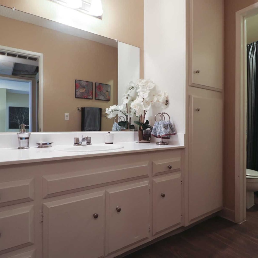 Resident bathroom with great lighting at Covina Grand in Covina, California