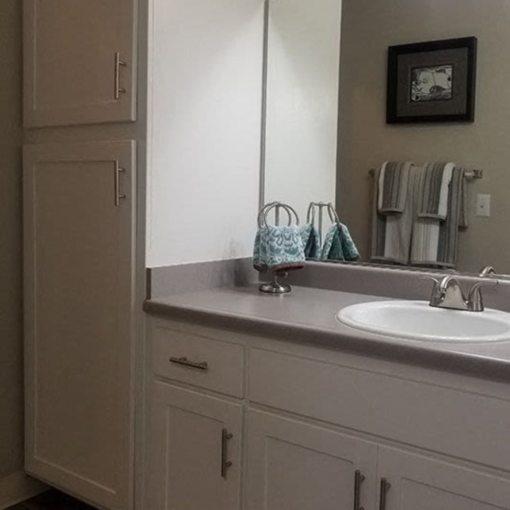Bathroom with extra cabinetry space at Covina Grand in Covina, California