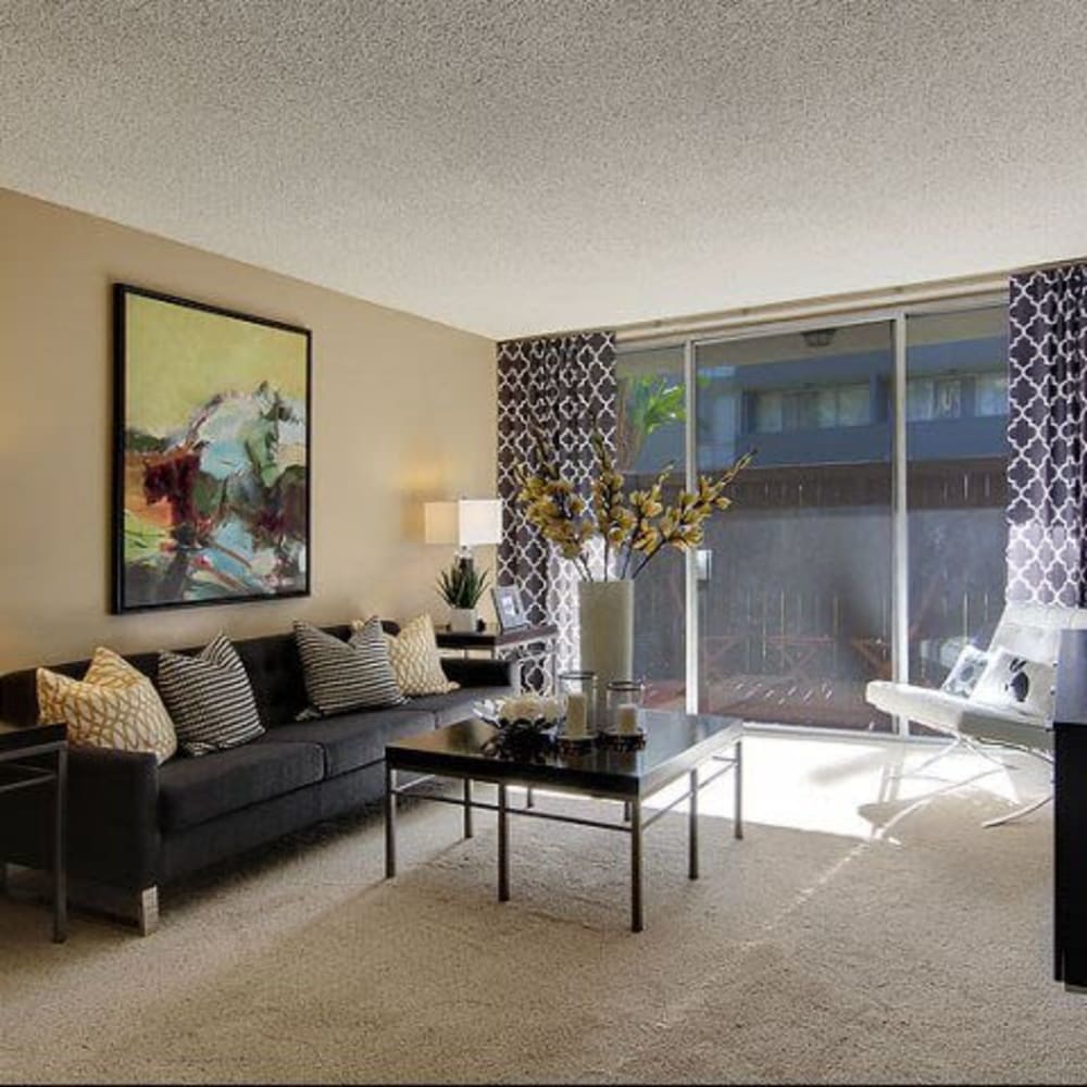 Living space featuring a couch and coffee table at Covina Grand in Covina, California