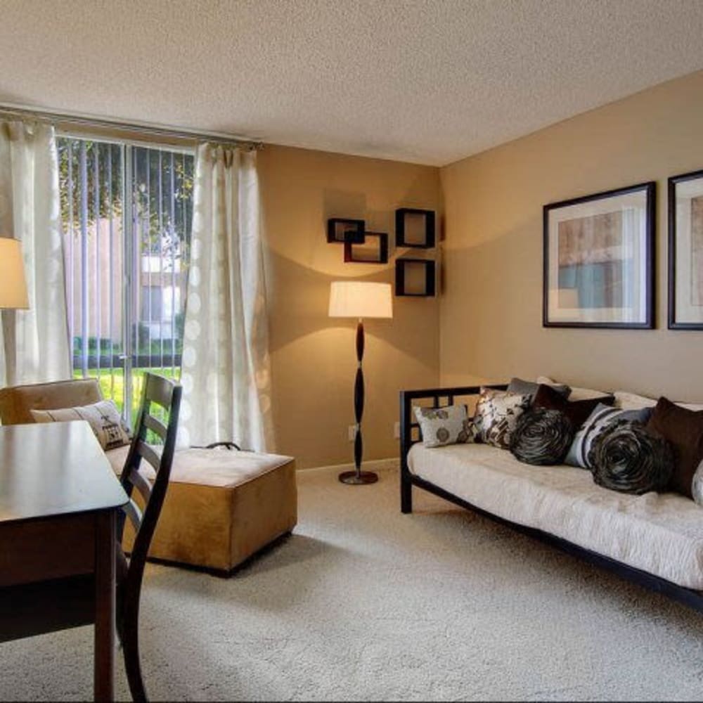 Bedroom with large windows at Covina Grand in Covina, California