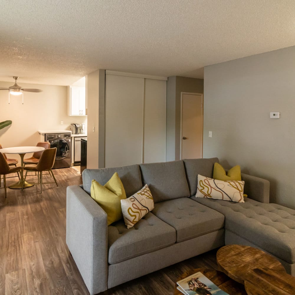 Living space with wood-style flooring at The Element Apartments in Reno, Nevada
