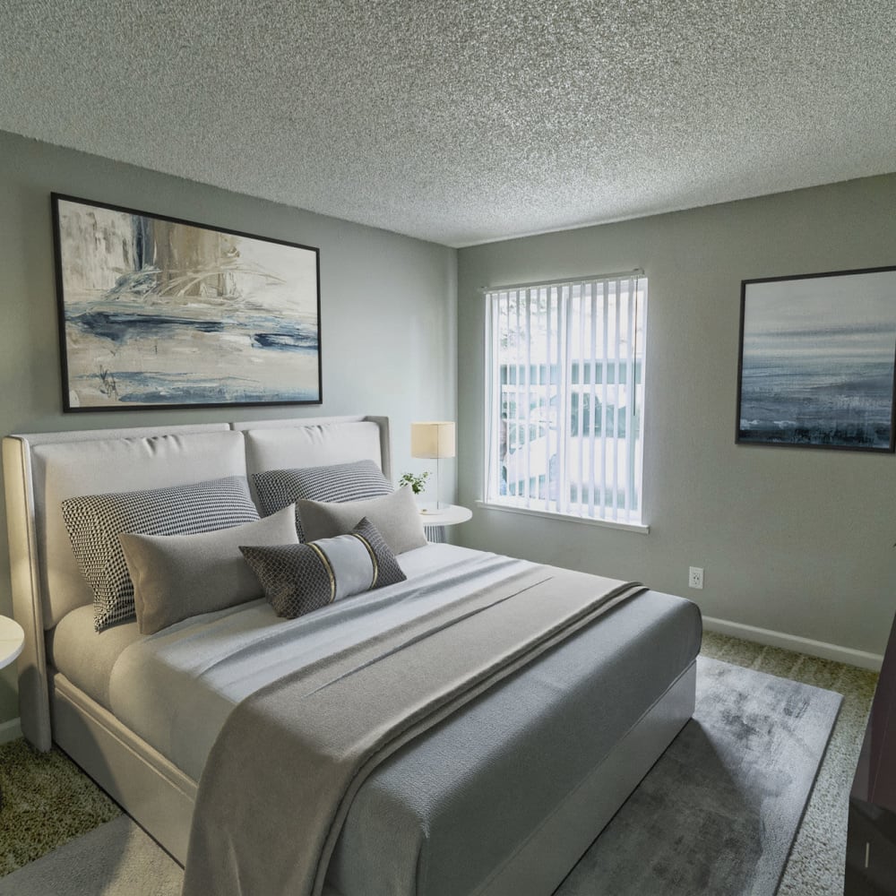 Bedroom with large windows at The Element Apartments in Reno, Nevada