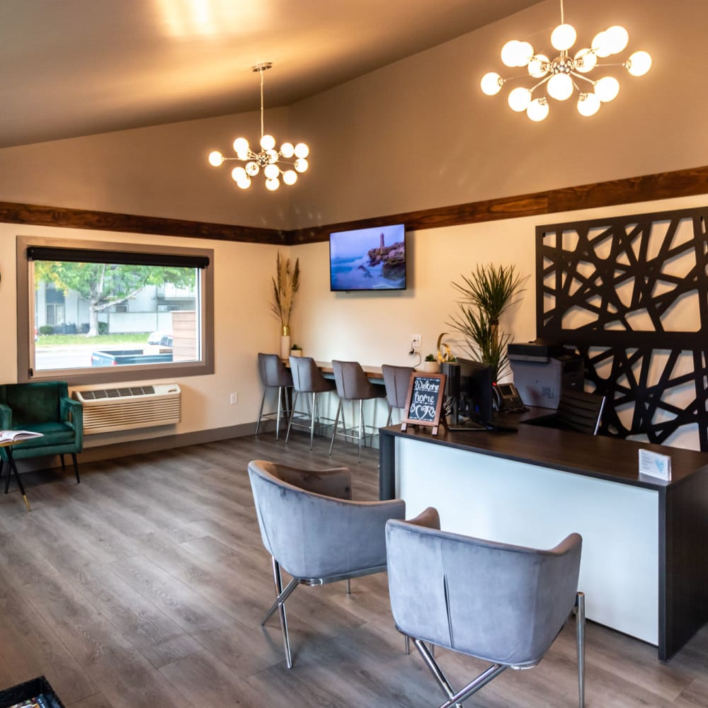 Leasing office with wood-style flooring at The Element Apartments in Reno, Nevada