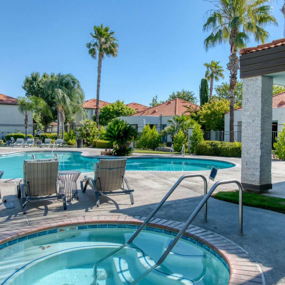 Pool and spa area at Ascent Townhome Apartments in Fresno, California