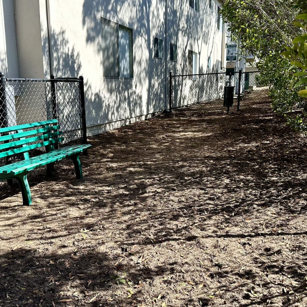 Dog park with a park bench at Marina Crescent in Marina, California