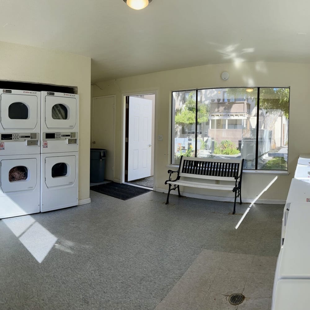 Laundry room with ample natural light at The Shoreline at Monterey Bay in Marina, California