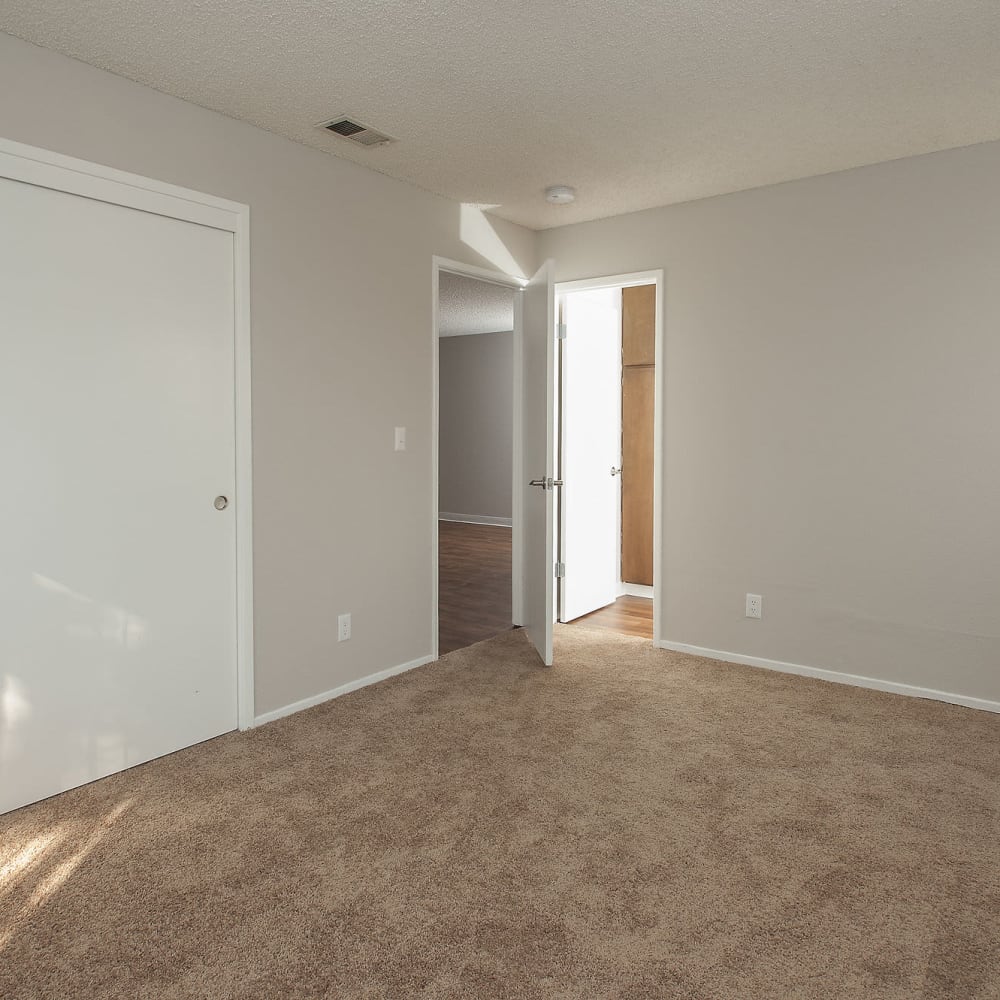 Bedroom with a closet at Woodside Park in Salinas, California