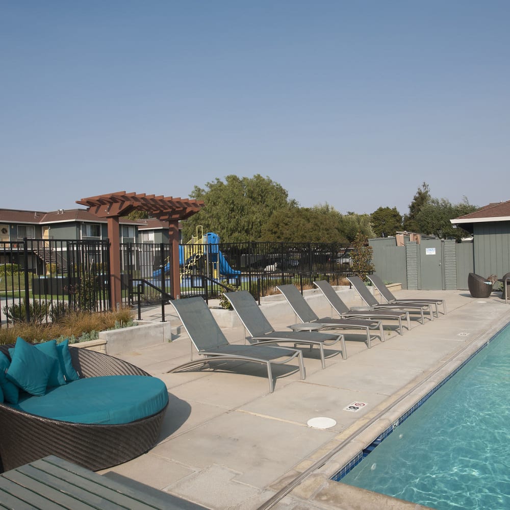 Pool side lounge chairs at Woodside Park in Salinas, California