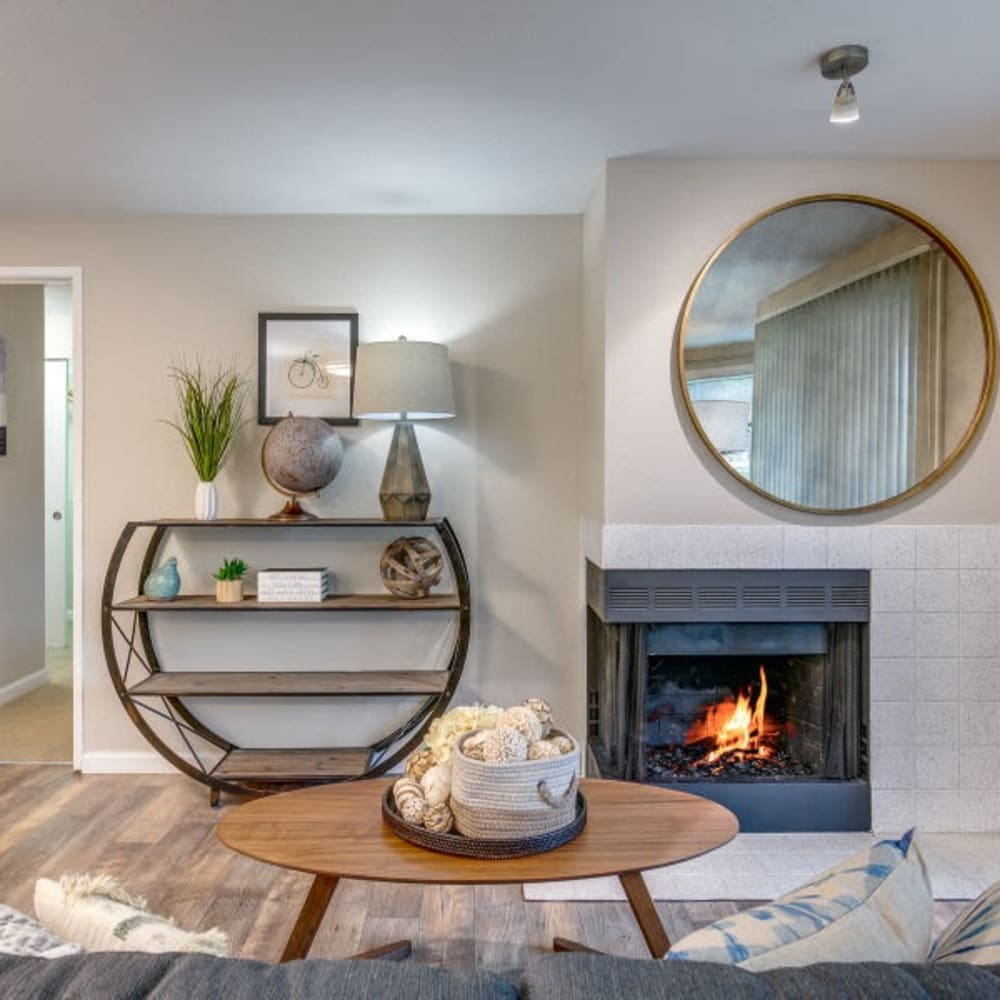 Living space with a fireplace at The Seasons in Lynnwood, Washington