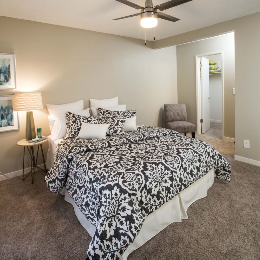Bedroom with plush carpeting at Amara Apartments in Santa Maria, California