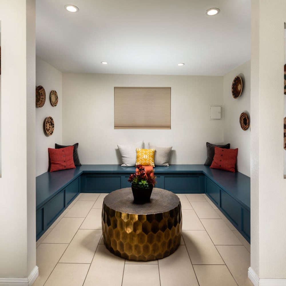 Colorful room with a coffee table at Amara Apartments in Santa Maria, California