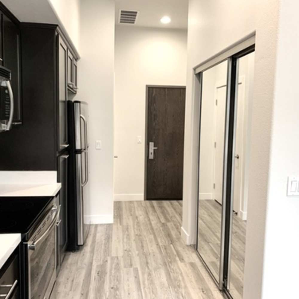 Kitchen and door to apartment at Urbana Rental Flats in San Diego, California