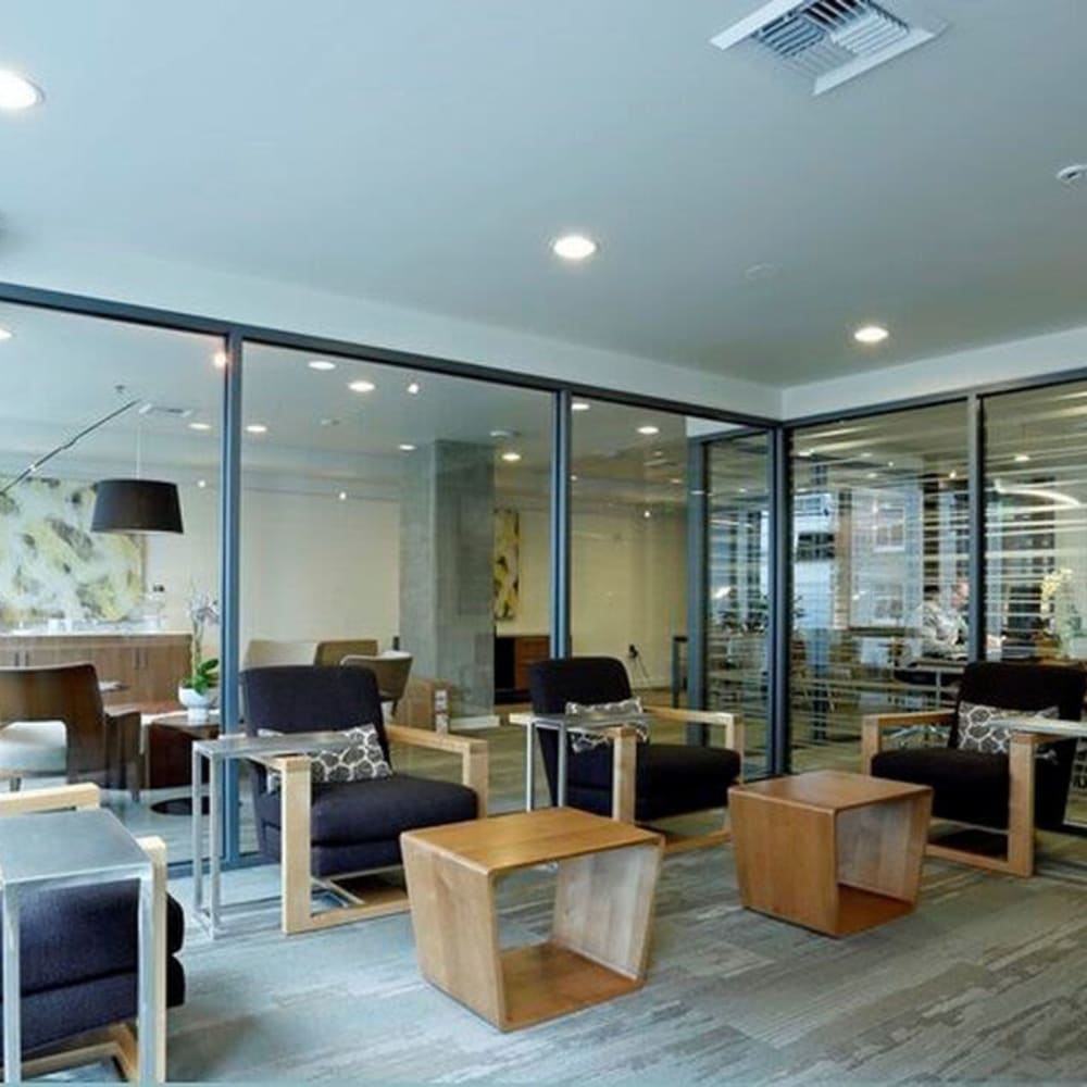Seating area with tables for residents at Viktoria in Seattle, Washington