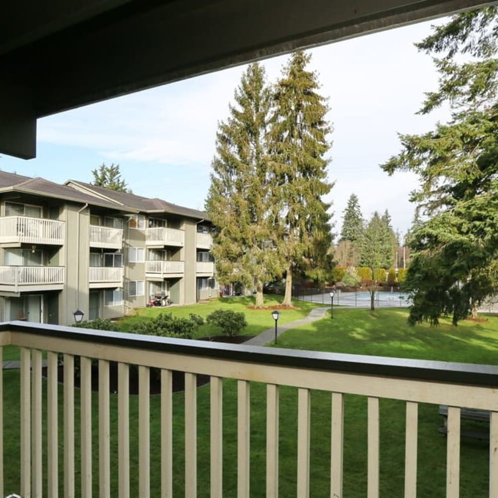Private balcony with beautiful courtyard views at Bluffs at Evergreen in Everett, Washington