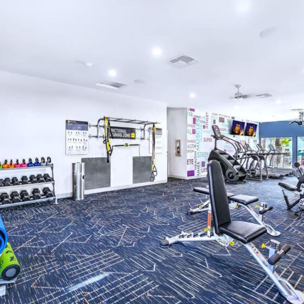 Fitness center with free-weights at Montego Bay in Henderson, Nevada