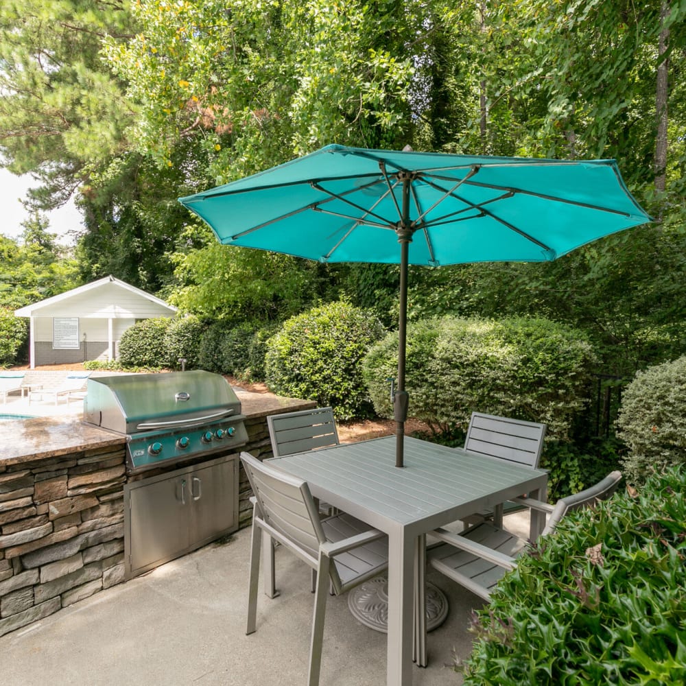 Patio table with an umbrella at Junction at Vinings in Smyrna, Georgia