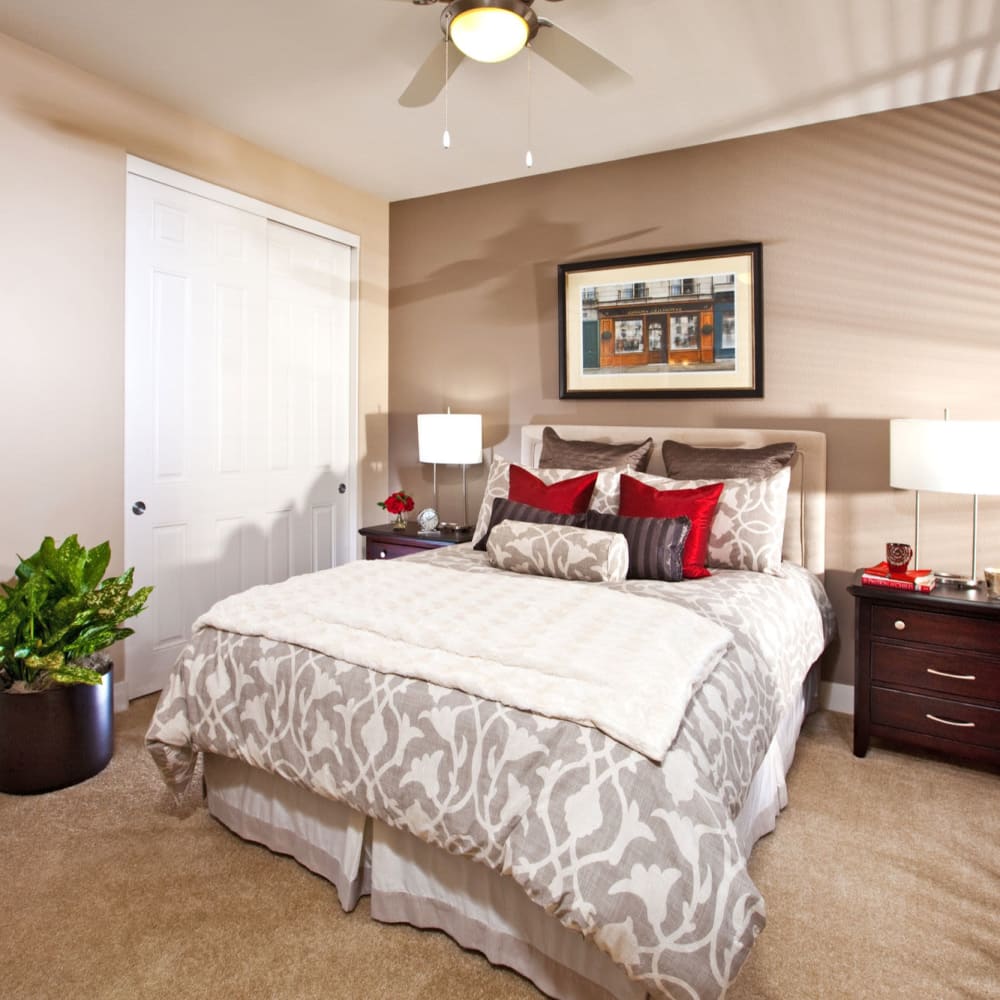 Bedroom with plush carpeting at St Claire in Santa Maria, California