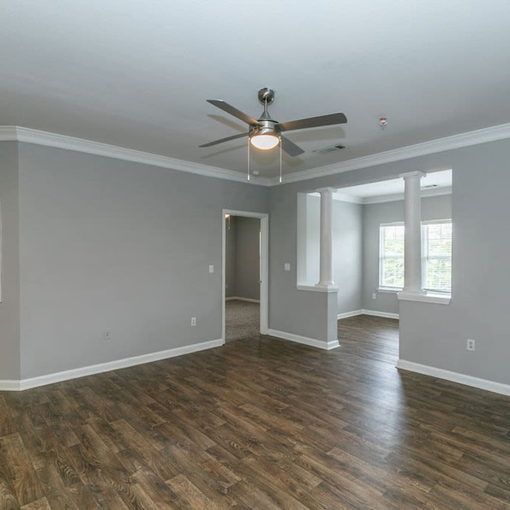 Living space with a ceiling fan at Sweetwater Creek in Lithia Springs, Georgia