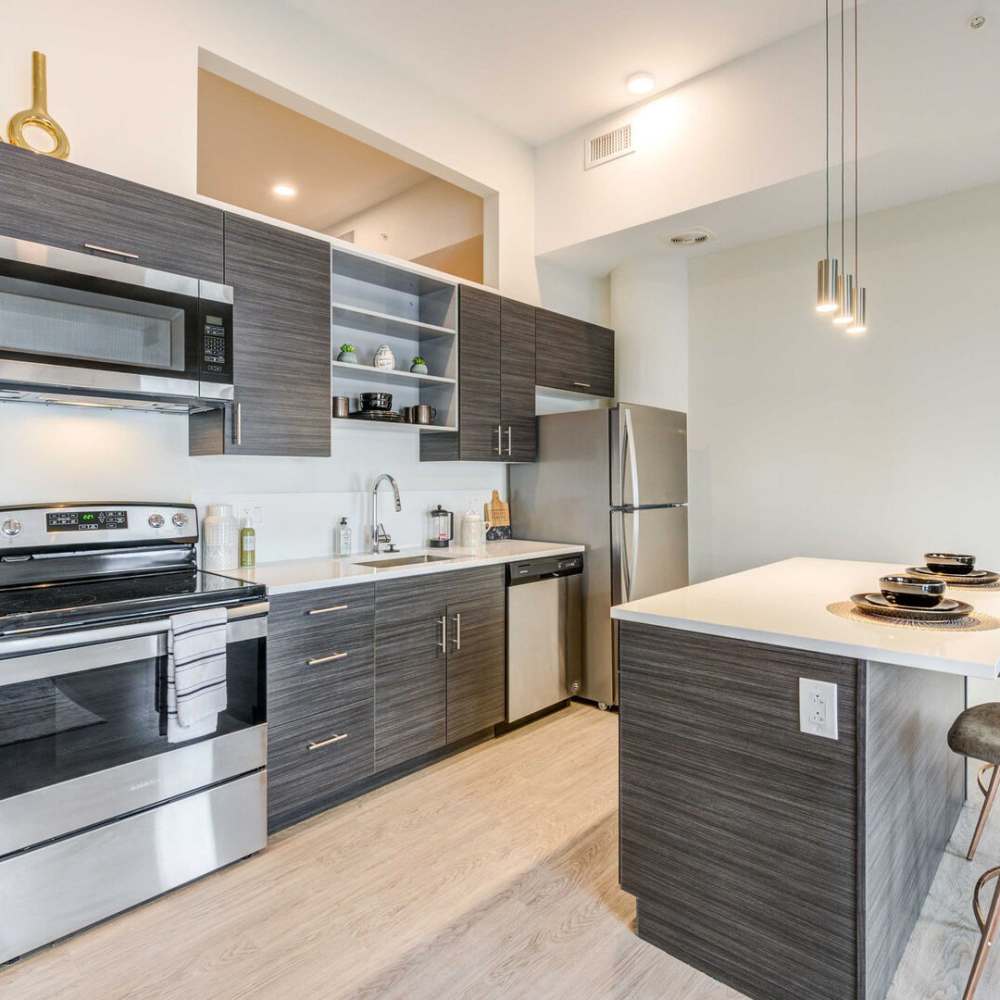 Fully equipped kitchen with stainless steel appliances at Euclid Grand in Cleveland, Ohio,  