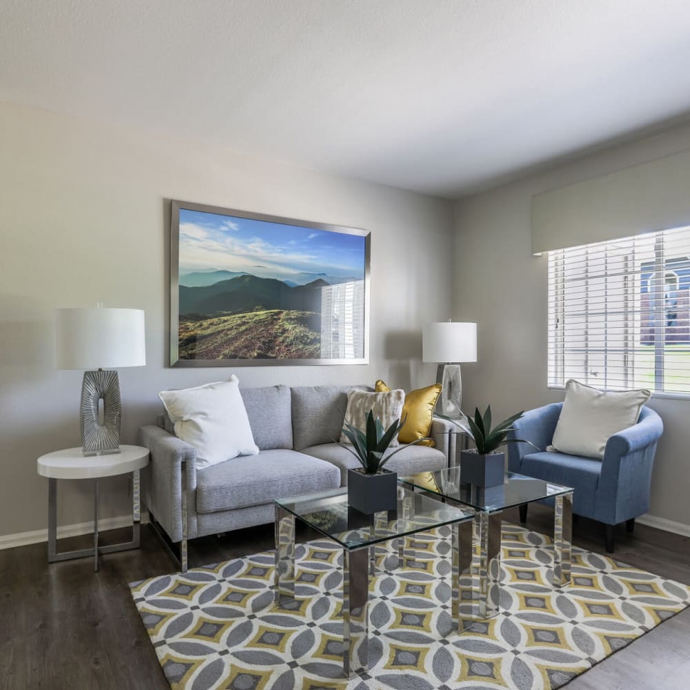 Living space with a sofa and coffee table at Magnolia Ridge in Thornton, Colorado