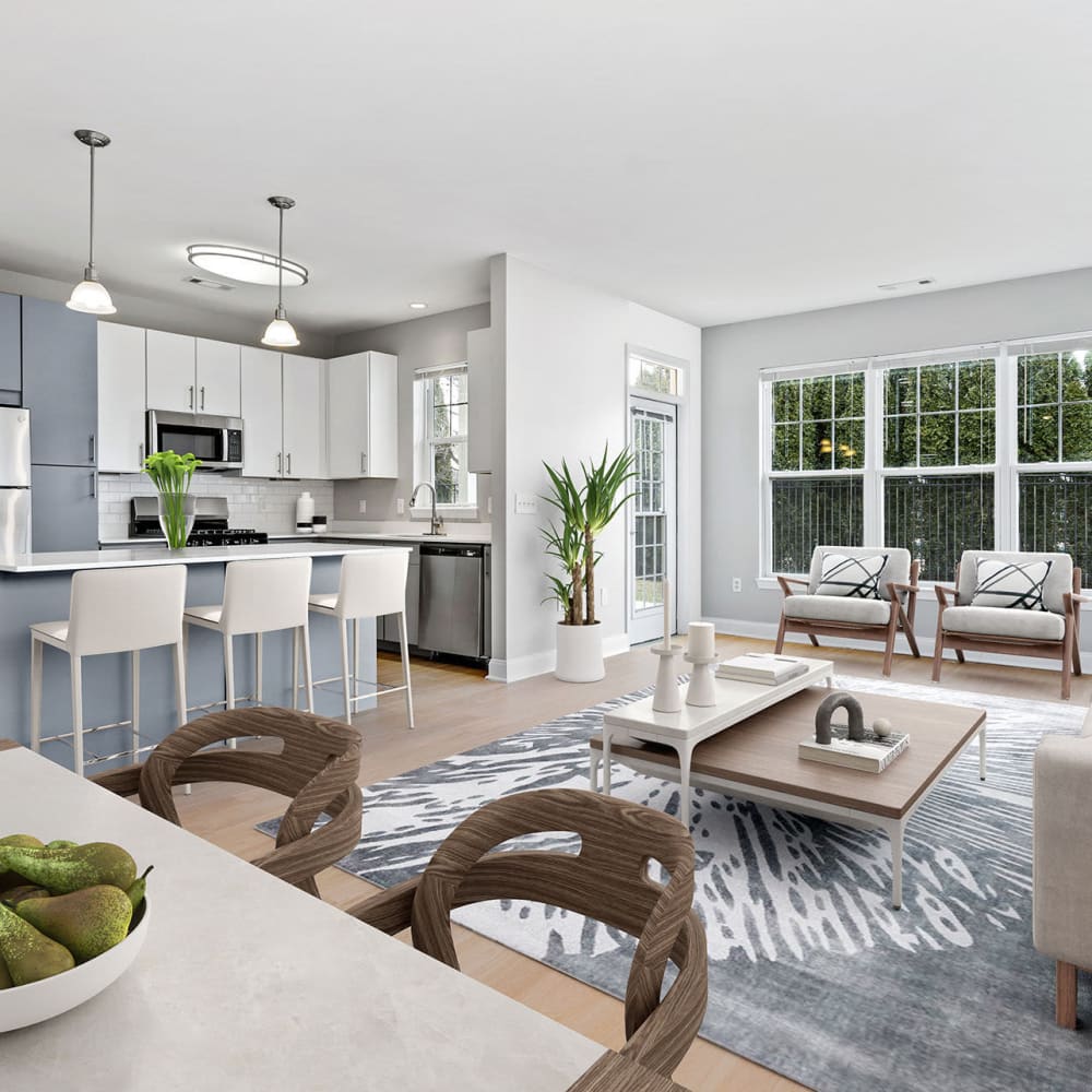Living space with large windows at The Preserve at Cohasset in Cohasset, Massachusetts