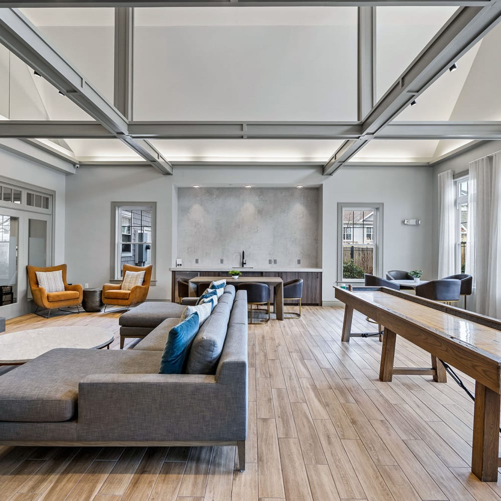 Clubhouse with lots of sofas and chairs at The Preserve at Cohasset in Cohasset, Massachusetts