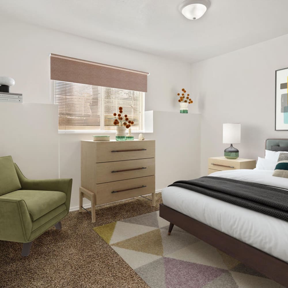 A furnished apartment bedroom at Elk Run Apartments in Magna, Utah