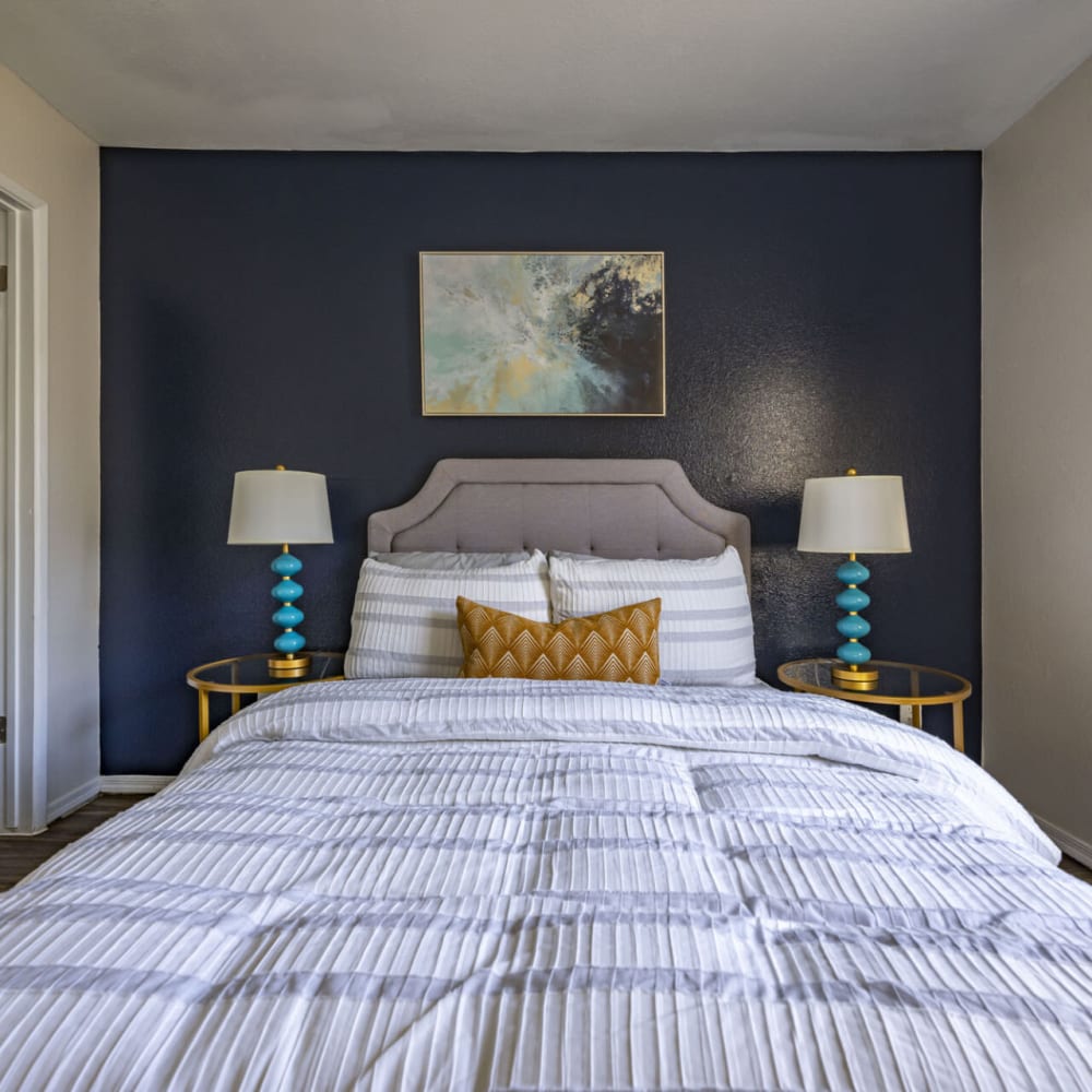 Bedroom with a bed and nightstands at The Bella in Phoenix, Arizona